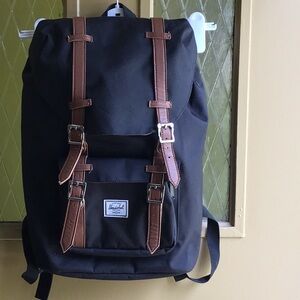 Herschel Backpack Black with Red and White accent (interior) fabric NEVER used